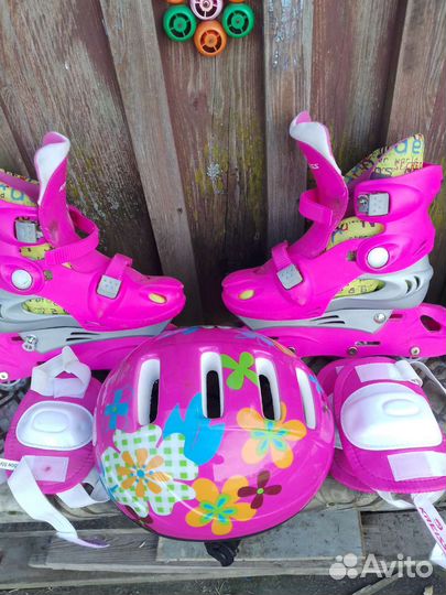 Роликовые коньки