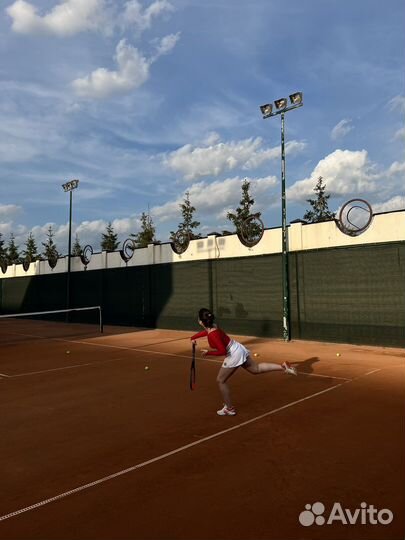 Тренер по большому теннису