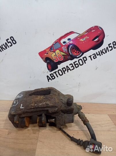 Суппорт тормозной передний левый Skoda Fabia