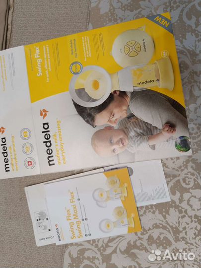 Молокоотсос medela swing flex электрический