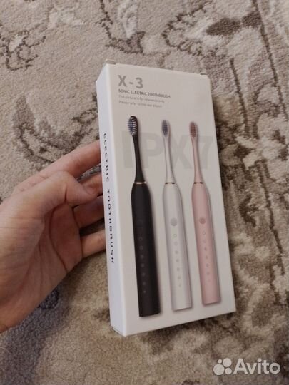 Электронная зубная щетка