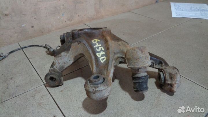 Кулак поворотный задний левый Mitsubishi Galant 9