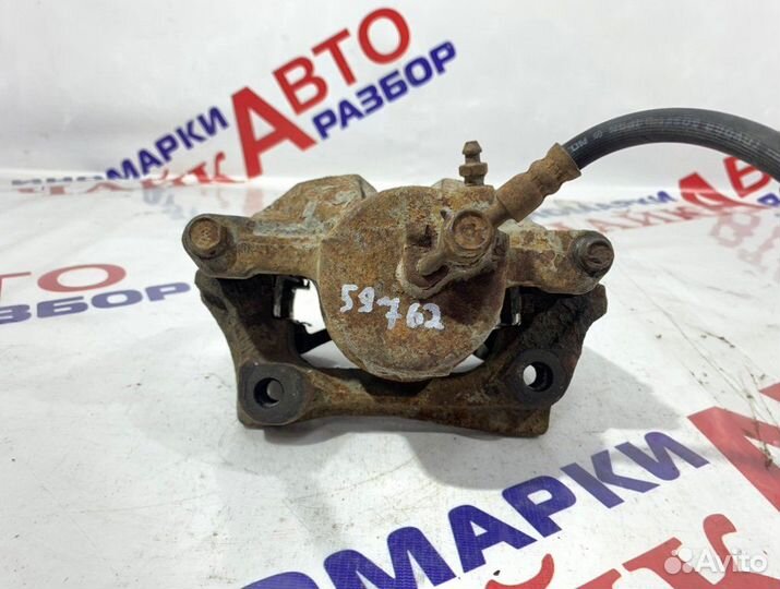 Суппорт тормозной передний левый Toyota Mark 2 110