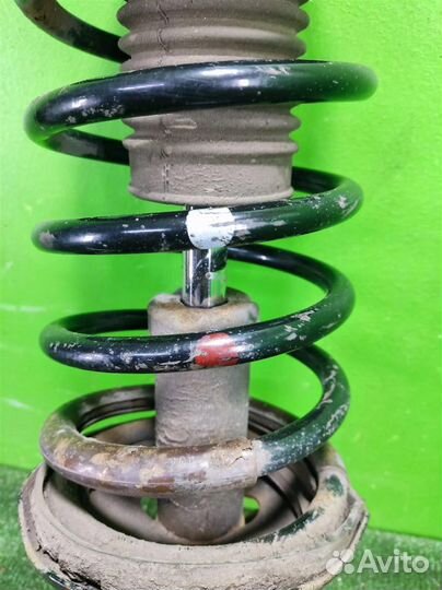 Стойка амортизатора передняя левая Chevrolet Rezz