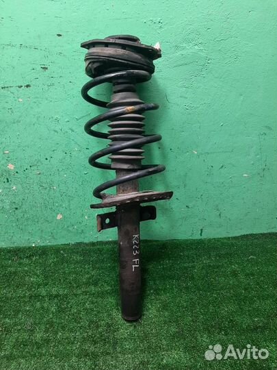 Стойка амортизатора передняя левая Renault Megane