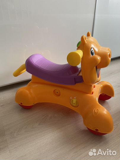 Игрушка бегемот-каталка толокар музыкальный