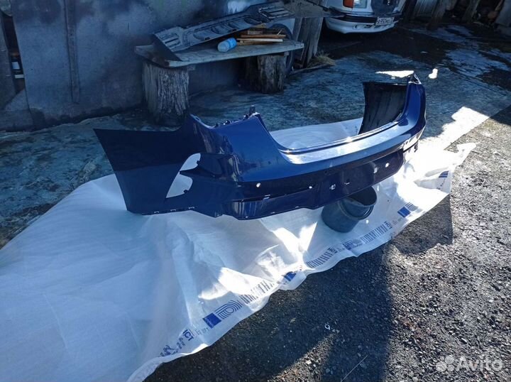 Бампер задний с юбкой KIA K5