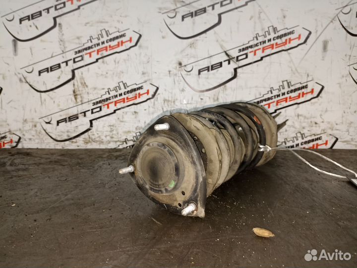 Стойка ходовки toyota raum NCZ20 NCZ25 передняя ле