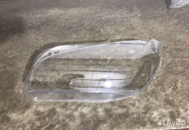 Стекло левой фары BMW X1 E84