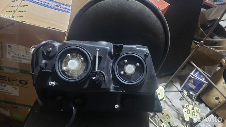 Фара левая Grand Cherokee Laredo (WJ, WG) 99 - 04г