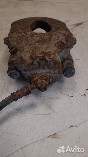 Суппорт тормозной передний левый Audi A3