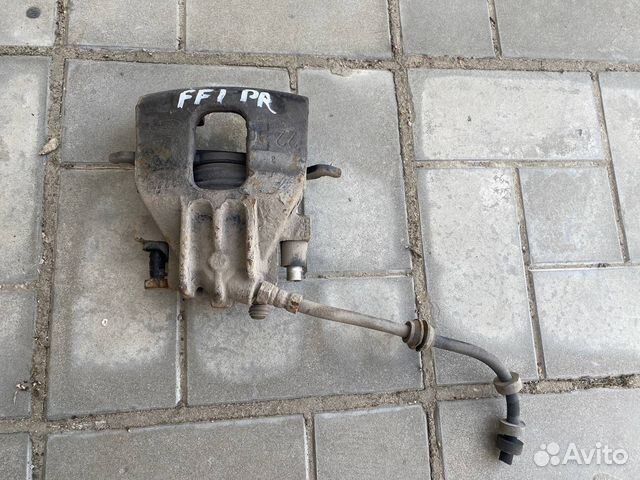 Тормозной суппорт передний правый Ford Focus 1