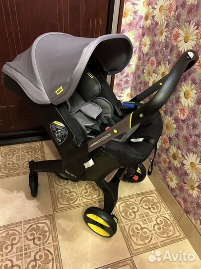 Коляска автокресло doona с базой isofix