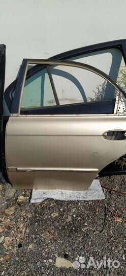 Дверь задняя левая Kia Spectra разборка