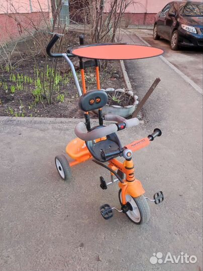 Трёхколёсный велосипед с ручкой