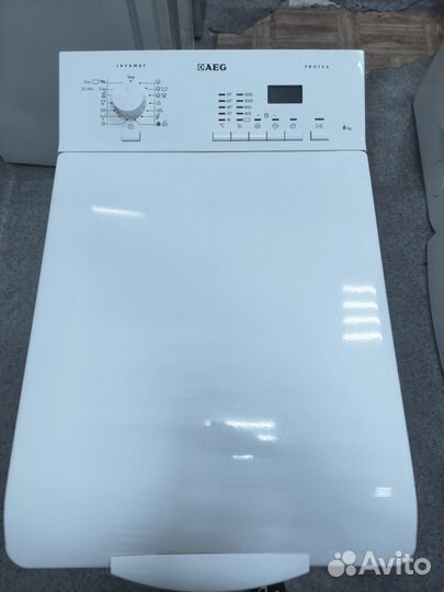 AEG с вертикальной загрузкой стиральная машина