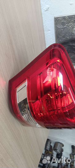 Фонарь задний левый. тоета корола Аксио 2010г.в