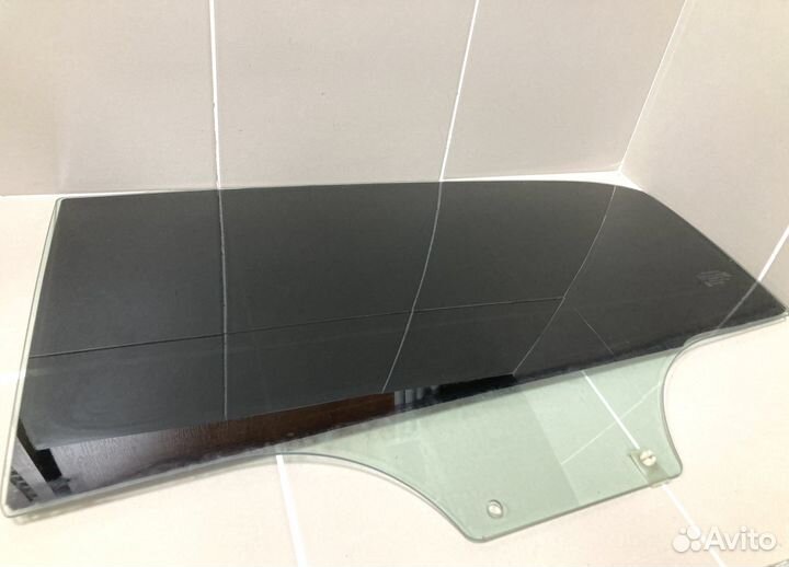 Стекло двери заднее левое Ssang Yong Actyon NEW