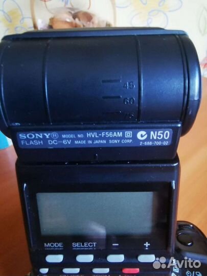 Зеркальный фотоаппарат с профессиональной вспышкой