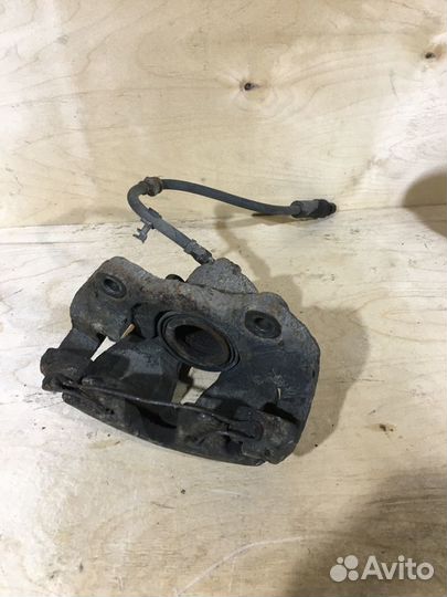 Суппорт передний левый Opel Astra H GTC