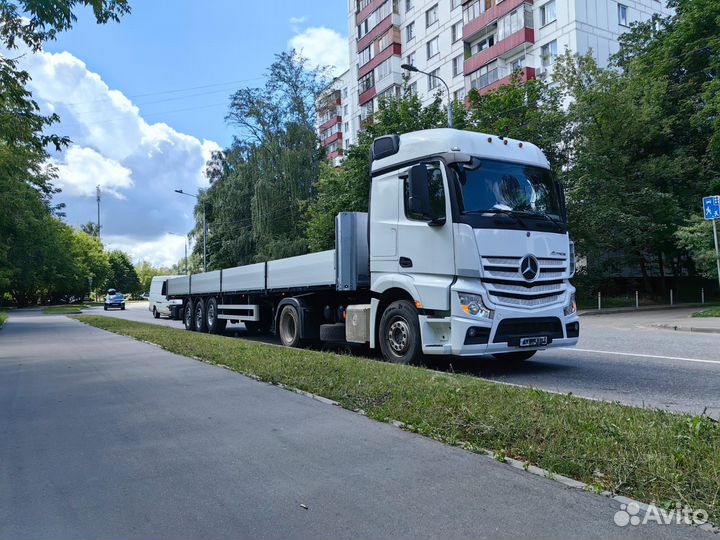 Водитель категории Е на бортовой полуприцеп