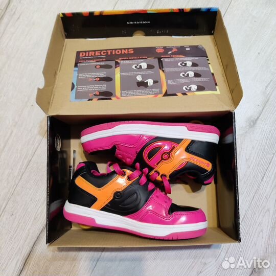 Кроссовки на роликах heelys