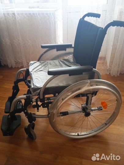 Инвалидная коляска новая