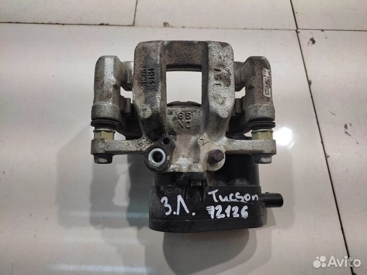 Суппорт (задний, левый) (Hyundai Tucson IV)