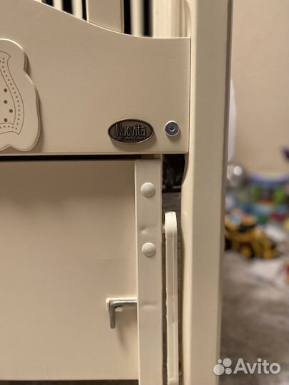 Детская кроватка Nuovita с продольным маятником