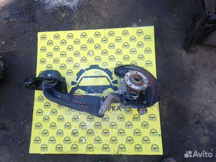 Кулак поворотный задний левый Skoda Yeti 09-18