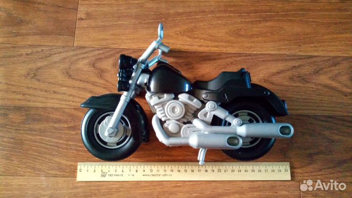 Мотоцикл 28*18см отдам за кофе