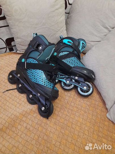 Роликовые коньки