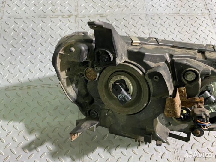 Фара галогеновая лев. перед. Mitsubishi Lancer 10