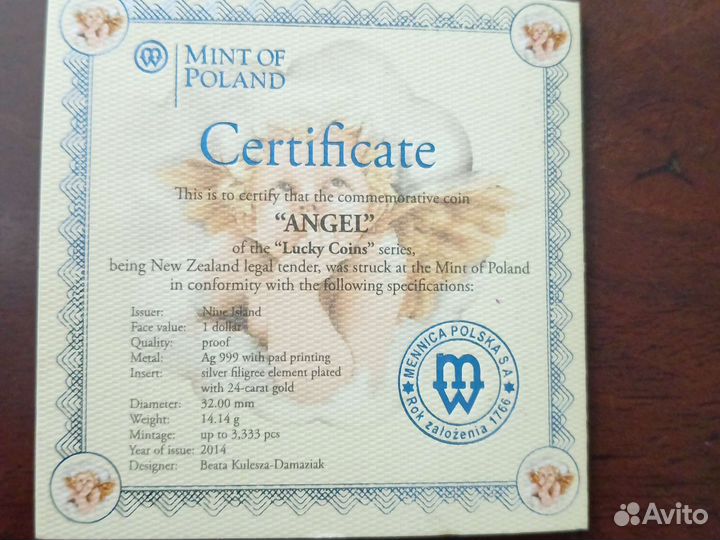 Монета ниуэ Ангел