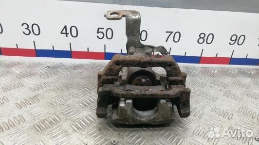 Суппорт тормозной задний правый toyota avensis T27