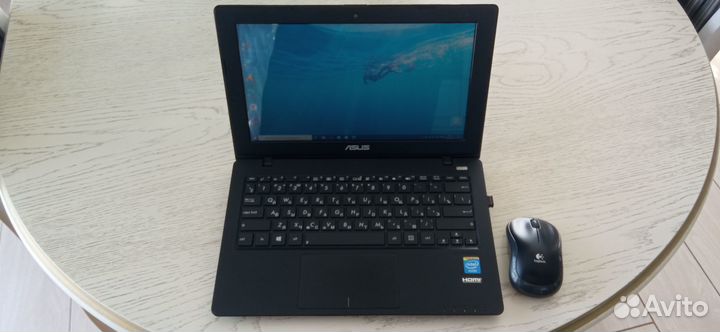 Ноутбук asus X200CA