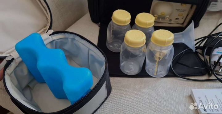 Молокоотсос medela электрический