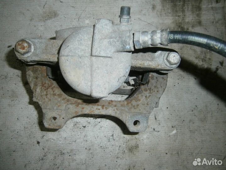 Суппорт передний правый Fiat Albea 2003) Оригиналь