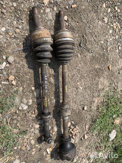 Привод левый Mitsubishi Carisma МКПП