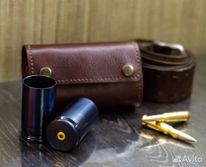 Стопки из гильз 2А42 в кожаном патронташе