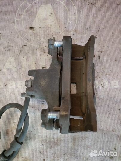 Суппорт тормозной передний левый Mitsubishi