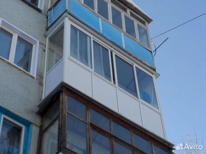 Остекление балкона раздвижными алюминиевыми окнами