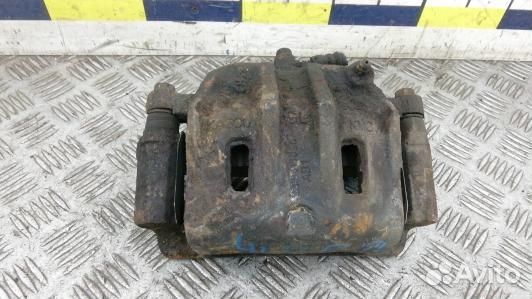 Суппорт тормозной передний левый KIA sorento 1 (4L