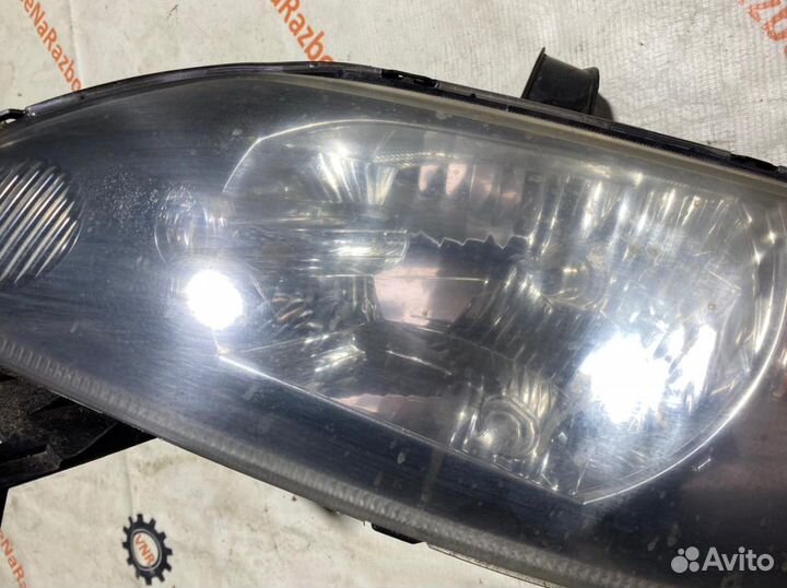 Фара передняя левая Mazda Demio DY3W