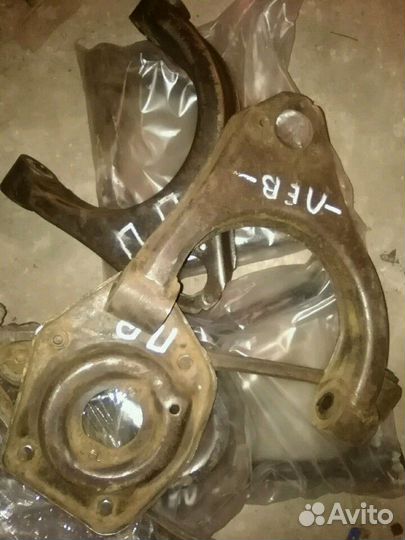 Рычаг передней подвески Волга верхний левый