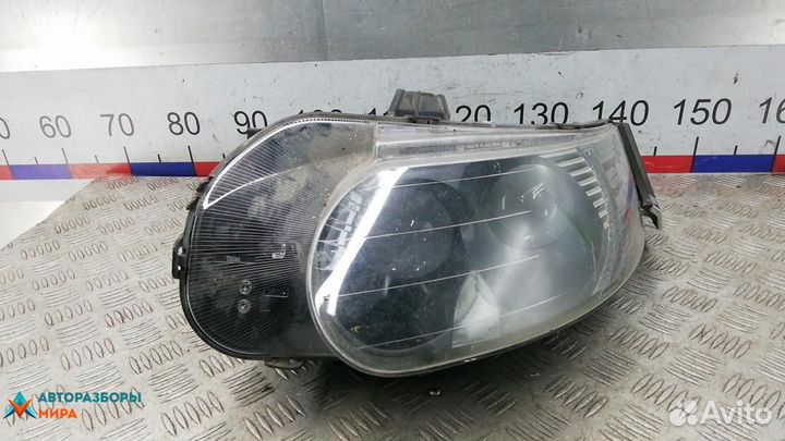 Фара левая Saab 9-5 2-й рест. 2006