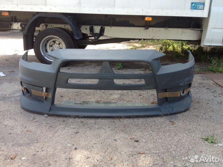 Передний бампер mitsubishi lancer 10
