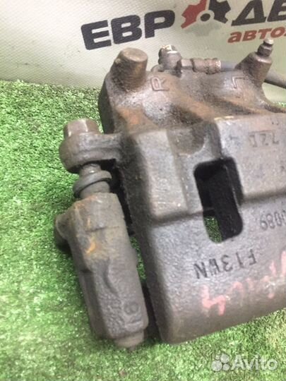 Суппорт тормозной передний левый Mazda Cx-7