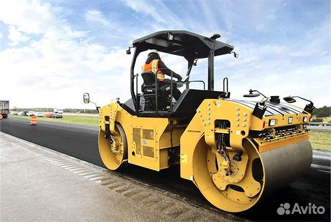 Машинист катка