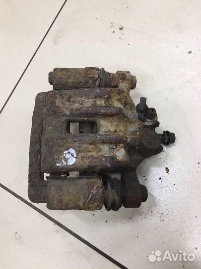 Суппорт задний правый Kia Sportage